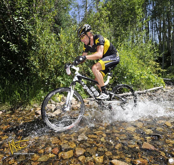 Armstrong on his way to winning the Colorado state pro men's cross-country championship. Photo courtesty vastaction.com width=