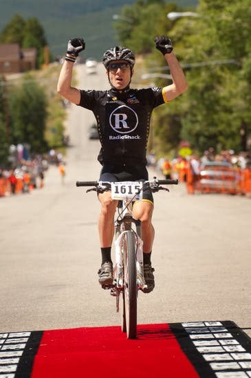Levi Leipheimer rolls across the finish in record time at the Leadville Trail 100. Photo by Rob O'Dea