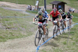 Willow Koerber, Georgia Gould, Katie Compton, Heather Irmiger and Mary McConneloug race each other at the 2010 national championships. They will all be racing for the U.S. at MTB worlds in Mont Ste Anne, Quebec. Photo by Brad Kaminski