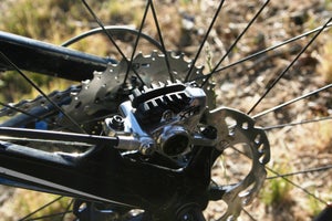 Fins protruding above the caliper body from the brake pads look a little funny, but Shimano says they keep brake heat to a minimum. Photo by Zack Vestal