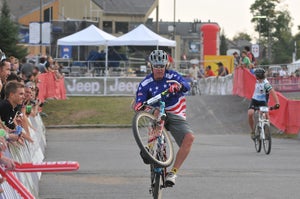 Legendary roostmaster Greg Herbold still rides a fine wheelie, 20 years after taking the first downhill title. Tom Moran