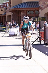 Heather Holmes was the first woman across the line. Photo by Monique Beeley/Mobe Photo