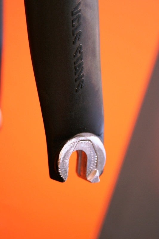 The "lawyer tab" on the bottom right of the fork reduces the likelihood that a wheel will fall out of the fork when the skewer lever is open. Photo: VeloNews.com