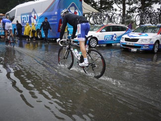 Where did my rim go? Jonathan Hivert heads to the soggy start on stage 4.