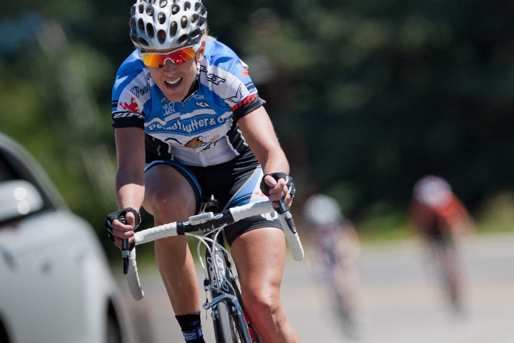 Kristin Armstrong (Peanut Butter & Co.-Twenty12) attacks breakaway companion Janel Holcomb (Colavita Forno d'Asolo) to take the victory in the final lap of the Snowmass circuit race.