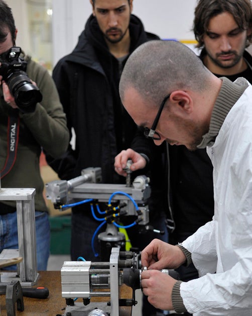 Journalists look on as a Look employee assembles the crank for a 695 frame. Photo: Caley Fretz | VeloNews.com