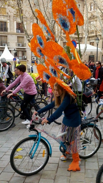 A peacock costume in the Diada Ciclista Parade. Photo: Ben King