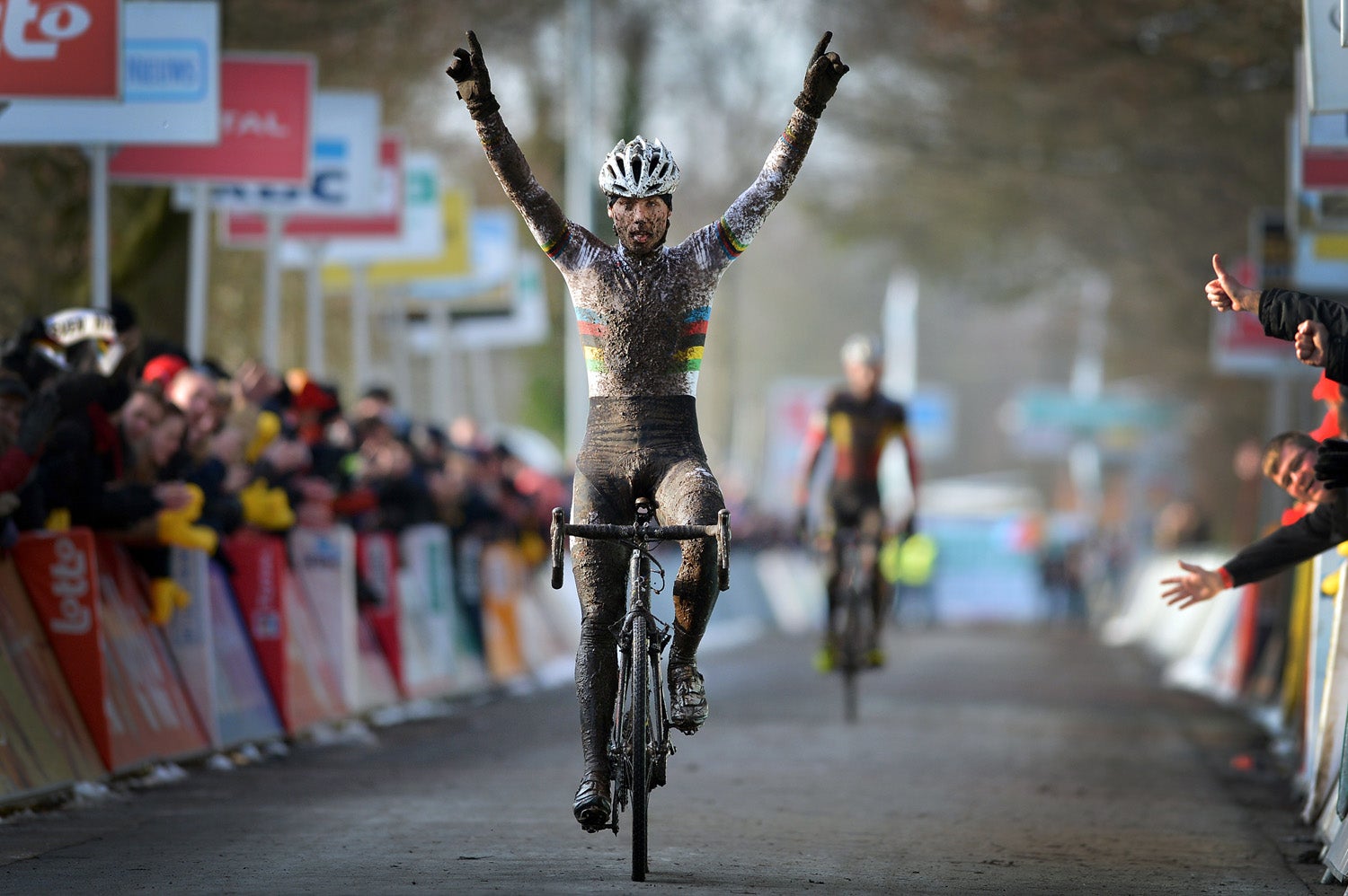World champion Sven Nys celebrates as he crosses the finish line to win the seventh round of the Superprestige series in Hoogstraten. Photo: David Stockman | AFP