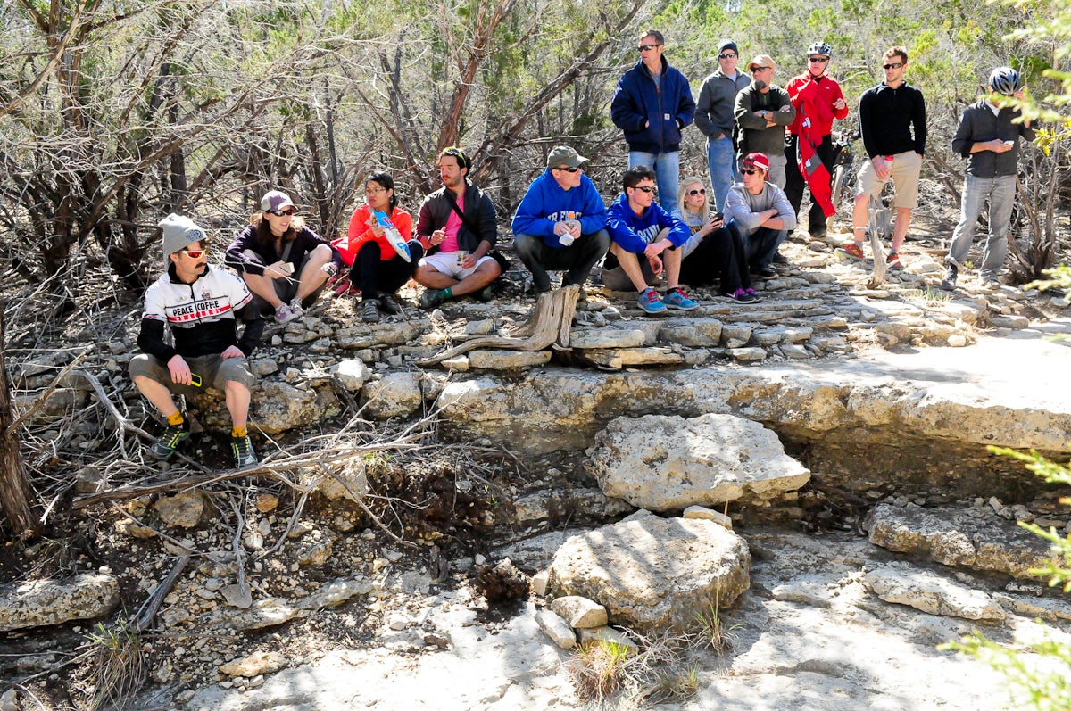 Spectators hoping to see a rider clear a technical section. Photo: Dave McElwaine