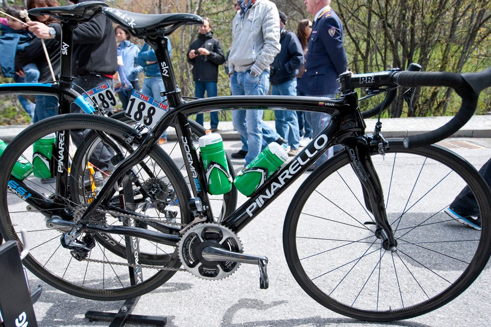 Rigoberto Uran is now the leader of Team Sky, following the departure of Bradley Wiggins, and that means his bike gets the special treatment Wiggins' did earlier in the race. The most obvious difference is a set of special super-light wheels, described by Sky staff only as "custom." The rims look similar but not quite identical to AX-Lightness ST24s, which weigh only 215 grams, and were perhaps a special item from that company for the team. The rest of Uran's bike is regular Sky issue: Dura-Ace Di2 9070 drivetrain, PRO components, a Fizik saddle and of course the Pinarello Dogma 65.1 frame. Photo: Caley Fretz | VeloNews.com