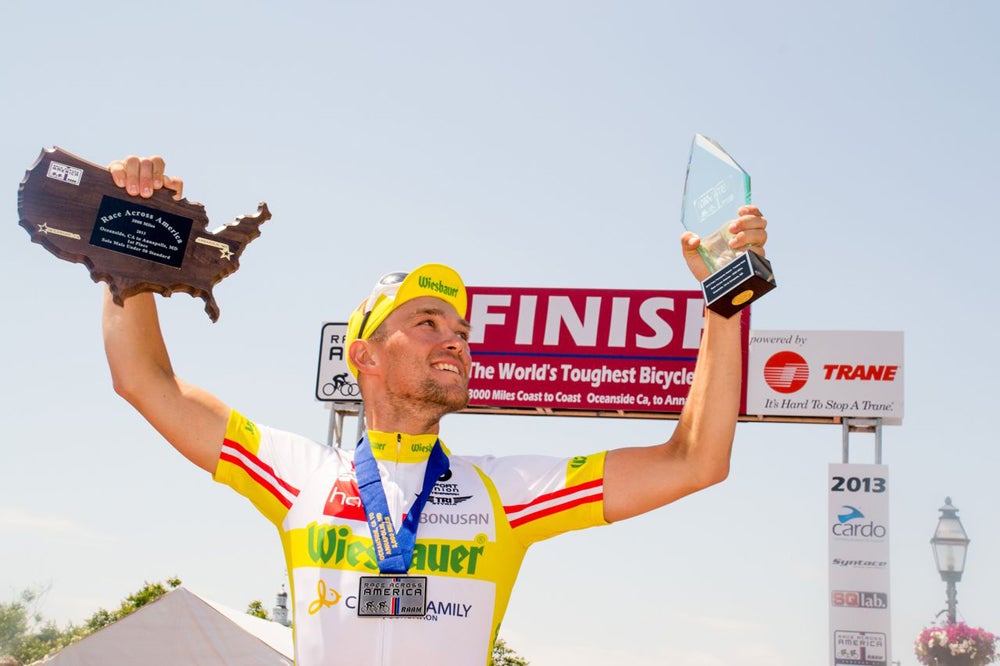 Christoph Strasser celebrates a record-breaking Race Across America in Annapolis, Maryland. Photo: Vic Armijo | Race Across America