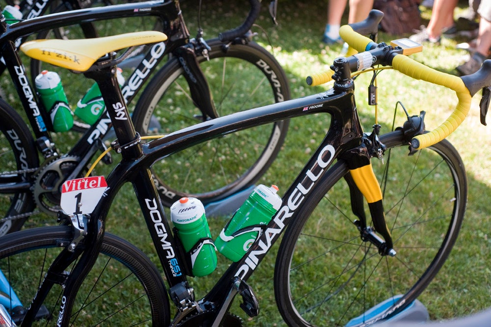 Froome rode this yellow-accented Pinarello Dogma to third on the penultimate stage to the top of le Semnoz, clinching the yellow jersey before Sunday's parade through Paris. <br><br>Sky mechanics wouldn't let us measure Froome's bike, as they have done with other team bikes in the past, but we can spot a few measurements: He's on a 126mm stem, 40cm bars, 172.5mm Dura-Ace cranks, and 23mm Veloflex tubulars. Photo: Caley Fretz | VeloNews.com