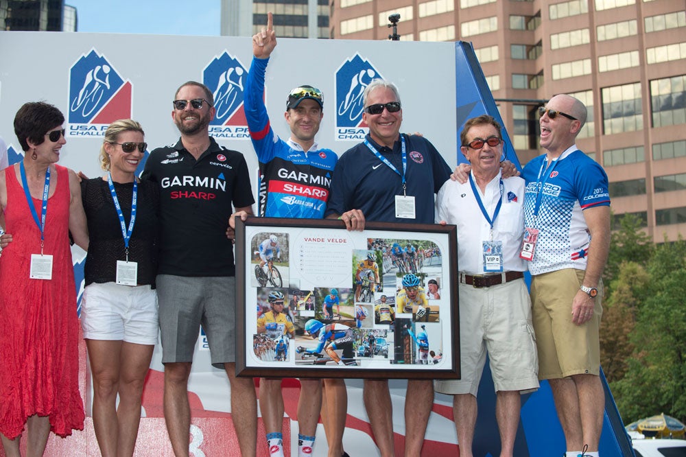 Christian Vande Velde is surrounded by family and Garmin-Sharp CEO Jonathan Vaughters in Denver on Sunday. Photo: Casey B. Gibson | <a href="http://www.cbgphoto.com">www.cbgphoto.com</a>