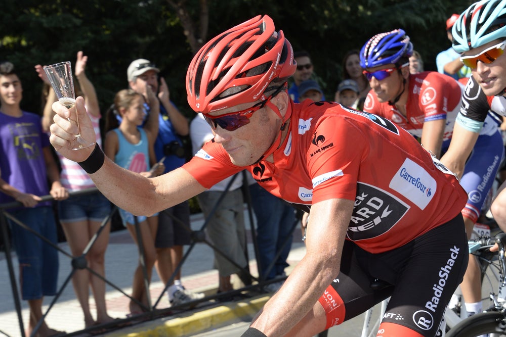 Chris Horner raised his champagne glass before cruising across the finish line in the final stage of the Vuelta. Photo: Graham Watson | <a id="www.grahamwatson.com" href="http://grahamwatson.com">www.grahamwatson.com</a>