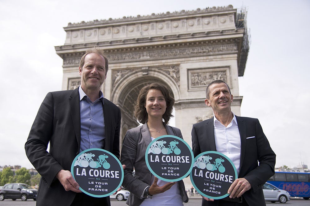 Tour de France director Christian Prudhomme, world champion Marianne Vos, and ASO CEO Yann Le Moënner presented the details of the La Course by le Tour de France Tuesday in Paris. Photo: Lionel Bonaventure | AFP