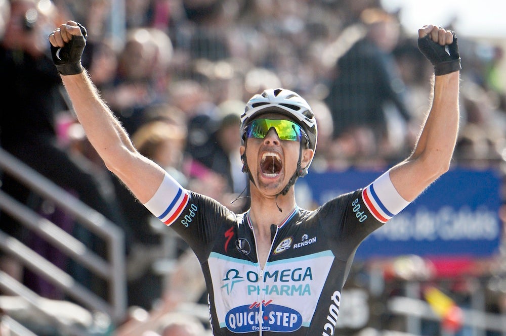 Niki Terpstra exults as he takes a solo victory on the Roubaix velodrome. Photo: AFP