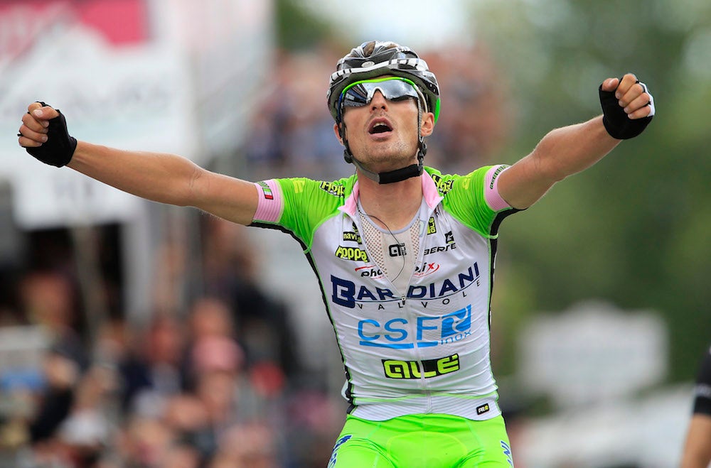 Enrico Battaglin celebrates as he comes from behind to win stage 14 of the Giro d'Italia. Photo: AFP