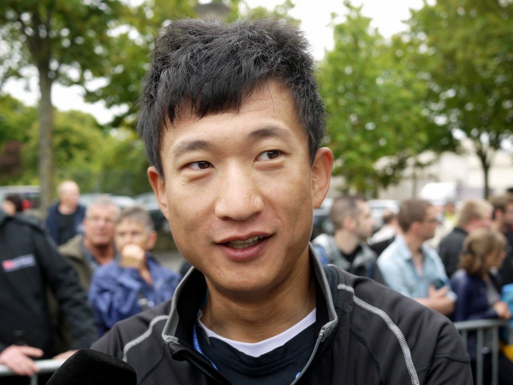 Cheng Ji is the first Chinese to start all three grand tours, and he wants to make it to Paris. Photo: Gregor Brown