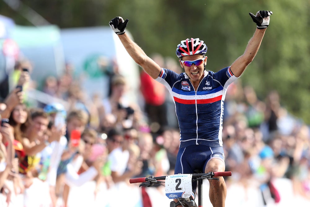 Frenchman Julien Absalon rode to victory yet again at UCI mountain bike world championships. He claimed his fifth title in Hafjell, Norway. Photo: AFP PHOTO | NTB SCANPIX |GEIR OLSEN | NORWAY OUT
