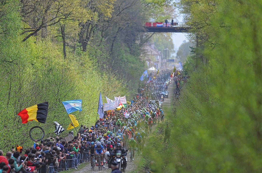 Easily one of cycling's most iconic roads, the Arenberg Forest in Paris-Roubaix attracted hordes of spectators, as it always does. Photo: Tim De Waele | <a href="http://www.tdwsport.com" target="_blank">TDWsport.com</a>