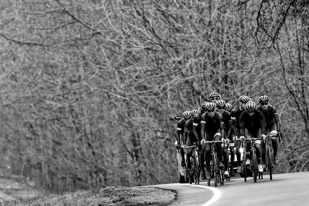 Spring riding often means gray weather and boney trees. Regardless, the Hincapie Racing Team ticked away the miles. Photo: Brian Hodes