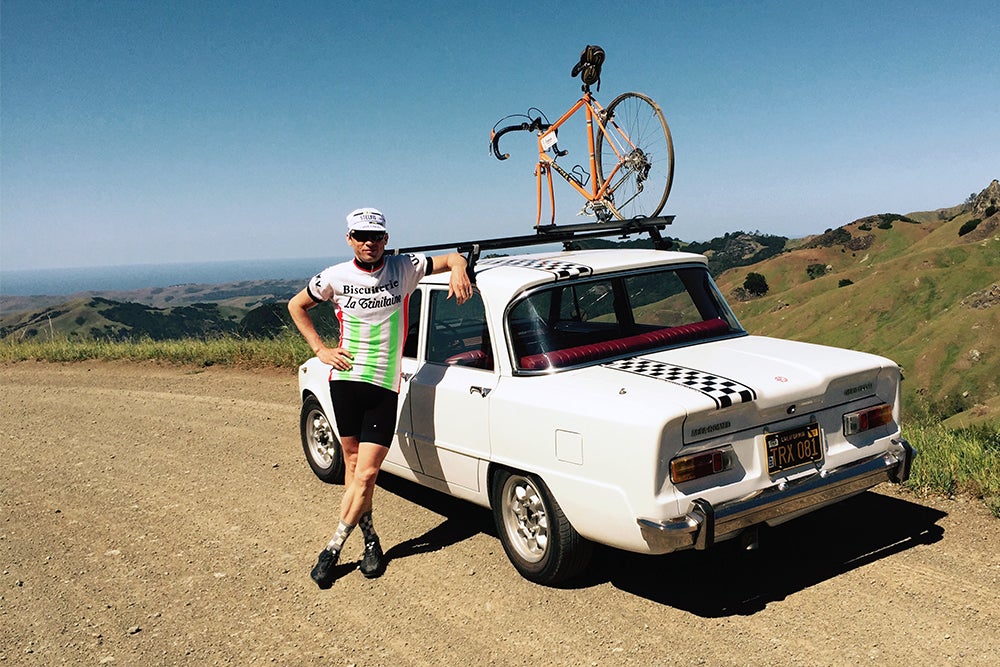 Eroica California is a celebration of the golden age of cycling, an event in which the beauty of fatigue and the taste of accomplishment can be acutely experienced. It is modeled after L'Eroica, the original vintage cycling event held among the rolling hills and white gravel roads of the Chianti region of Italy since 1997. Here, Chris Case stands beside a 1969 Alfa Romeo Giulia 1300 TI, with his borrowed orange De Rosa mounted to the roof rack, near the top of Cypress Mountain, overlooking the Pacific Ocean. Photo: Chris Case | VeloNews.com