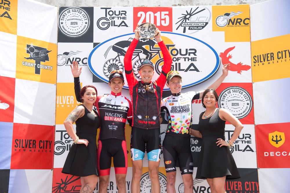 An ecstatic Rob Britton shows off the winner's trophy, alongside second-place finisher Daniel Jaramillo, and third-place finisher Gavin Mannion. Photo: Casey B. Gibson | <a href="http://www.cbgphoto.com">www.cbgphoto.com</a>