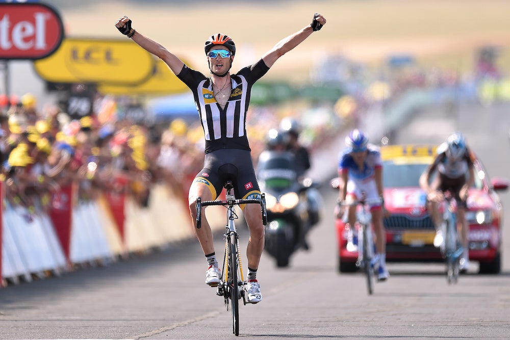 Steve Cummings celebrated a first ever Tour de France stage win for his MTN-Qhubeka team as he crossed the finish line. Photo: Tim De Waele | <a href="http://www.tdwsport.com" target="_blank">TDWsport.com</a>