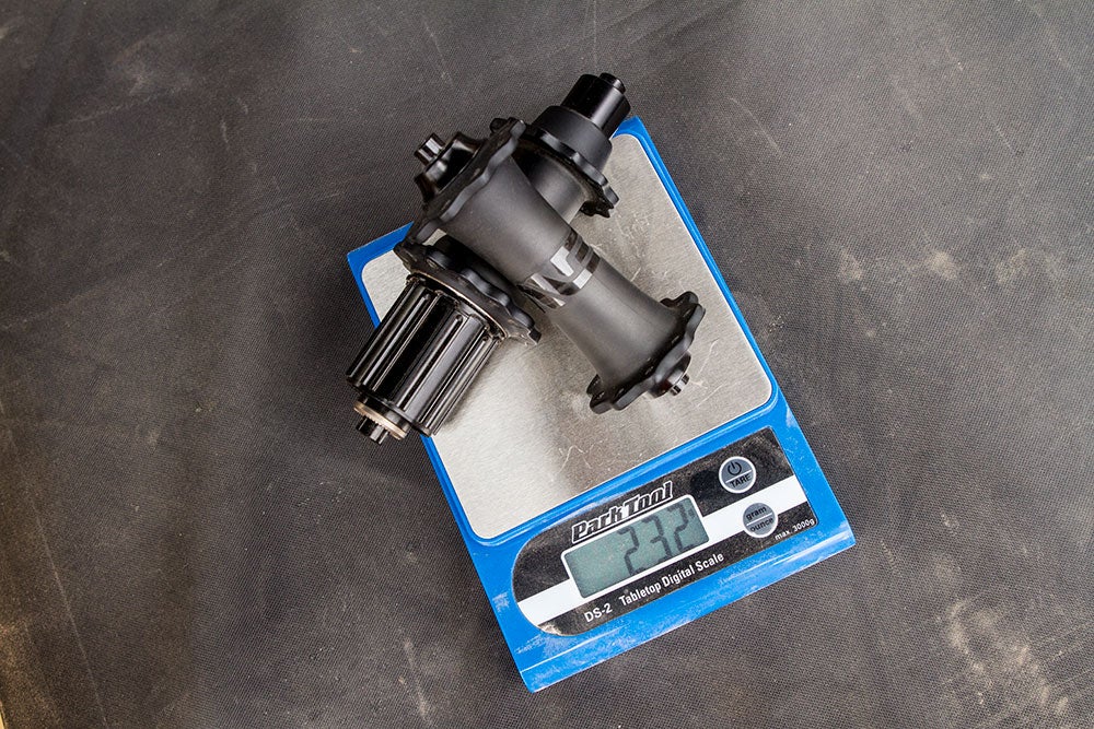 ENVE Composites continues its pursuit of light and tough carbon wheel technology with new ENVE hubs that tip the scales at a paltry 232 grams. The internals are DT Swiss, and the hub shells are full carbon. They will come standard on the new SES 2.2 wheels. Photo: Dan Cavallari | VeloNews