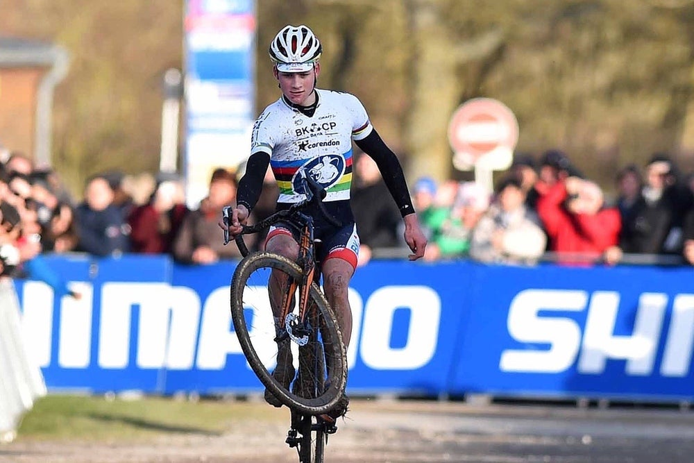 Mathieu van der Poel shows his wheelie skills after winning the World Cup in France. Photo: Tim De Waele | TDWsport.com