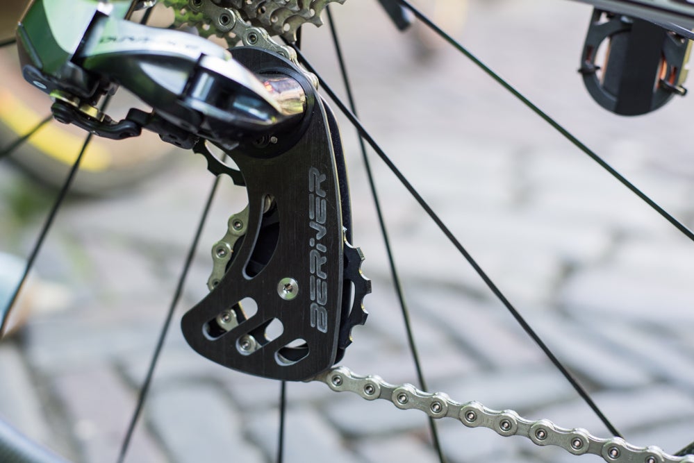 The entire Cannondale team is riding these Berner pulleys, featuring more teeth than a standard Shimano derailleur. The idea is that a larger cog forces less articulation of the chain, resulting in decreased drivetrain losses. Photo: Caley Fretz | VeloNews.com
