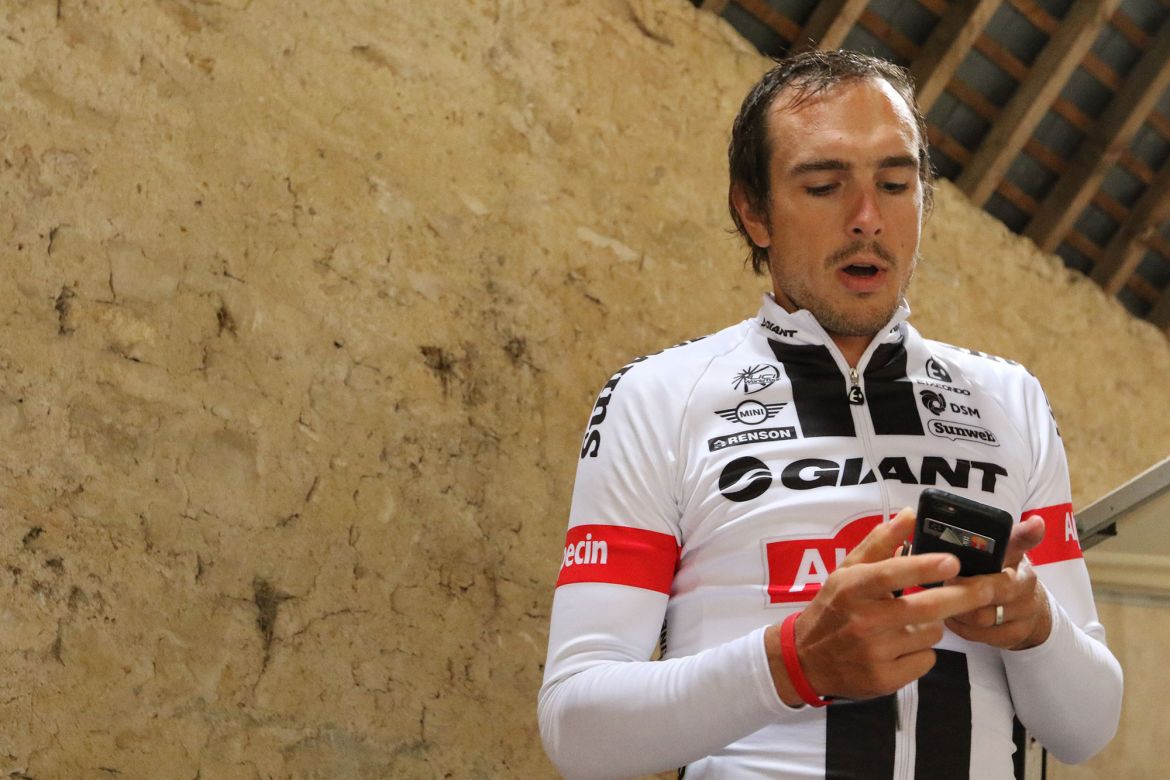 Even the pros get bored on the trainer. Degenkolb checked his phone for messages or perhaps his next move on "Words With Friends." Photo: Dan Cavallari | VeloNews.com
