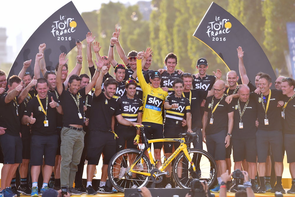 Dave Brailsford and his Sky squad celebrated a job well done on the Tour's final podium in Paris. Photo: Tim De Waele | <a href="http://www.tdwsport.com" target="_blank">TDWsport.com</a>