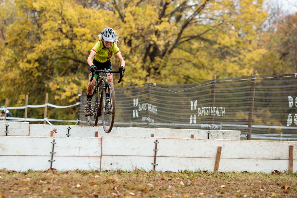 Calvin Conaway clears the barriers during competition in the U13 race. Photo: @pinnedgrit/Jake Orness