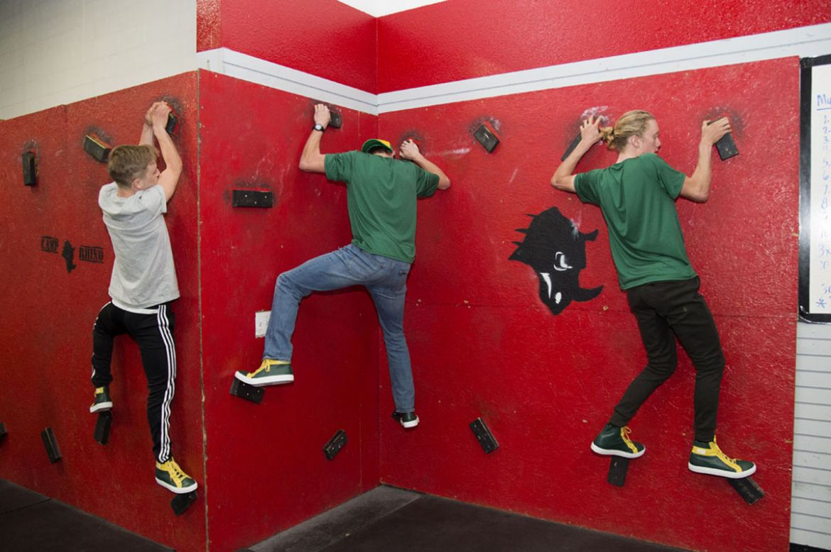 Aevolo riders tackle a climbing wall at the team's Las Vegas camp. Credit: Casey B. Gibson cbgphoto.com