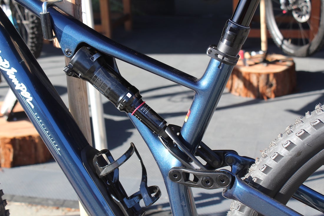 Close-up of Stumpjumper mountain bike with a shock between the top tube and seat post