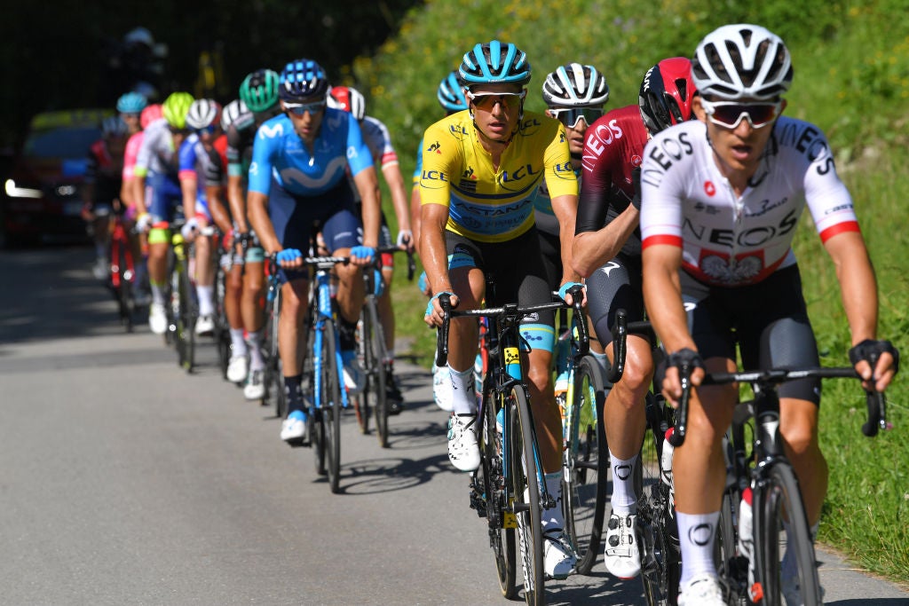 CHAMPÉRY, SWITZERLAND - JUNE 16: Michal Kwiatkowski of Poland and Team INEOS /  Wout Poels of The Netherlands and Team INEOS / Jakob Fuglsang of Denmark and Astana Pro Team Yellow Leader Jersey / during the 71st Criterium du Dauphine 2019, Stage 8 a 113,5km stage from Cluses to Champéry - Montée de Champéry 1036m / #Dauphine / @dauphine / on June 16, 2019 in Champéry, Switzerland. (Photo by Tim de Waele/Getty Images)