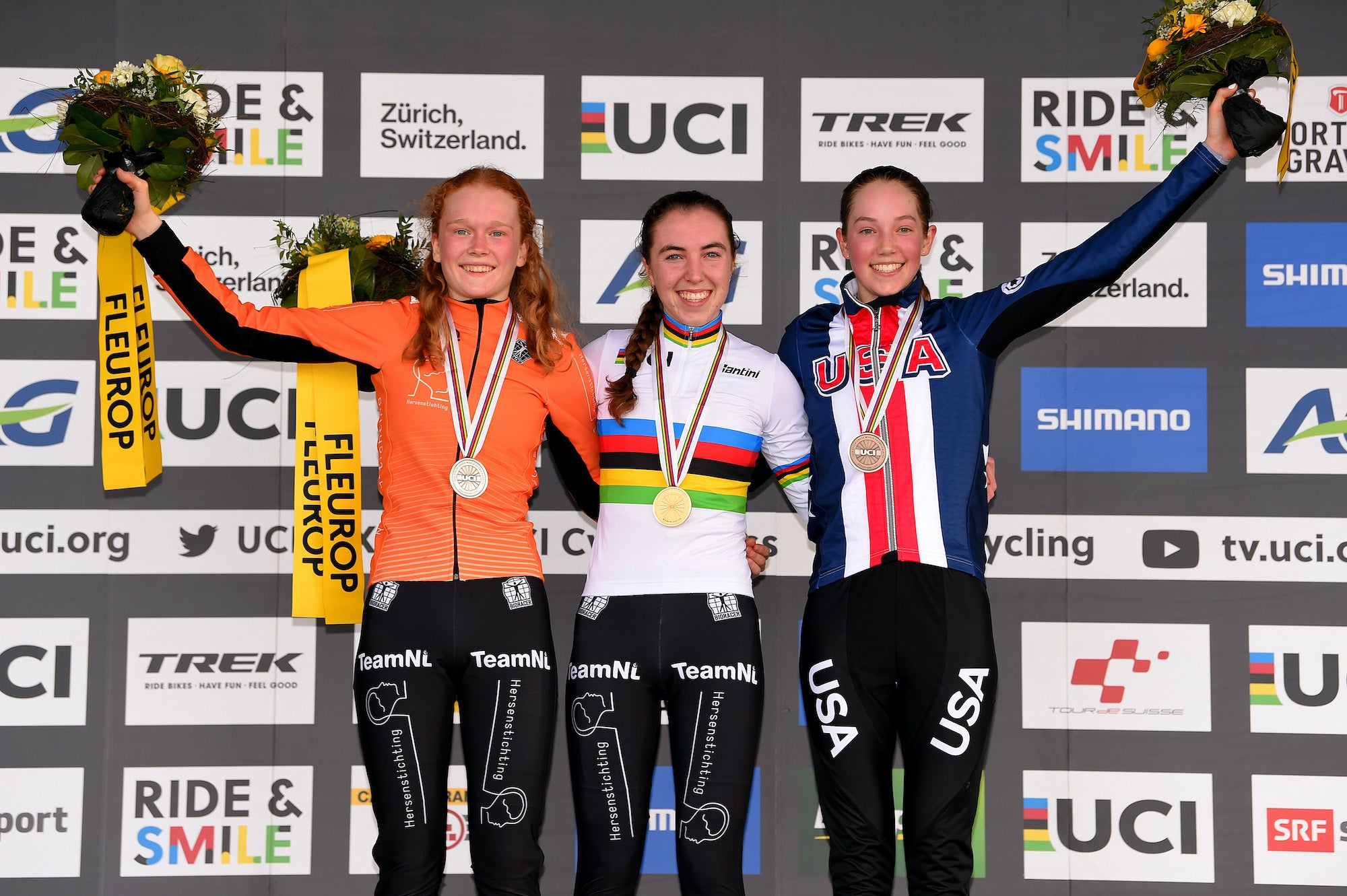 DUBENDORF, SWITZERLAND - FEBRUARY 01: Podium / Puck Pieterse of The Netherlands Silver medal / Shirin Van Anrooij of The Netherlands World Champion Jersey Gold medal / Madigan Munro of The United States Gold medal / Celebration / during the 71st Cyclocross World Championships D√ºbendorf 2020, Women Junior / @UCI_CX / #Dubendorf2020 / on February 01, 2020 in Dubendorf, Switzerland. (Photo by Luc Claessen/Getty Images)