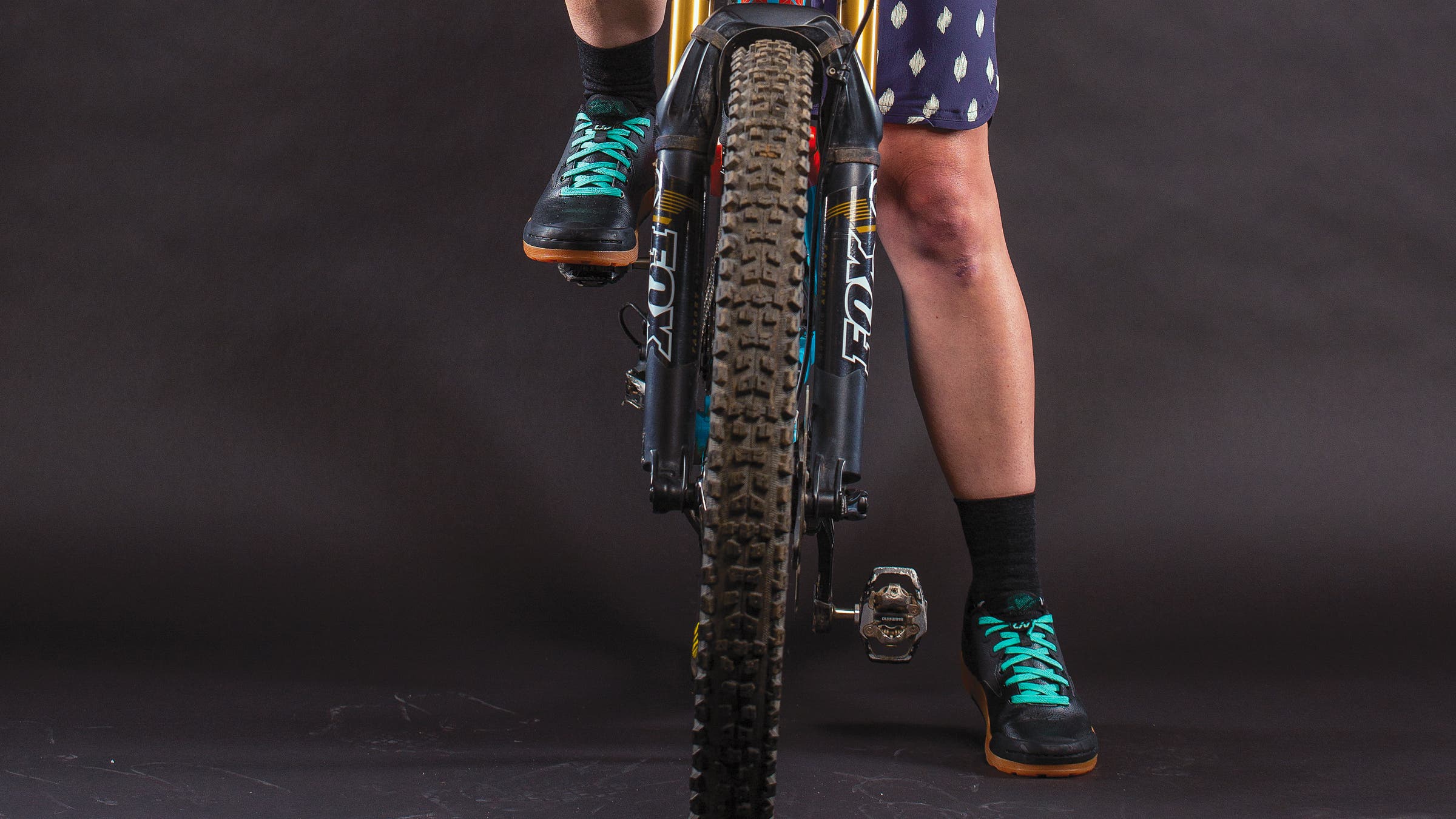 Close-up of woman's shoes on a mountain bike