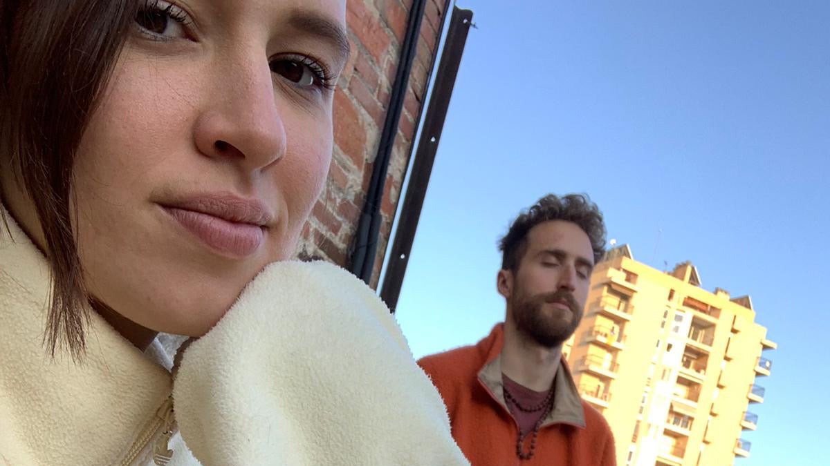 Kasia and Taylor on their rooftop apartment