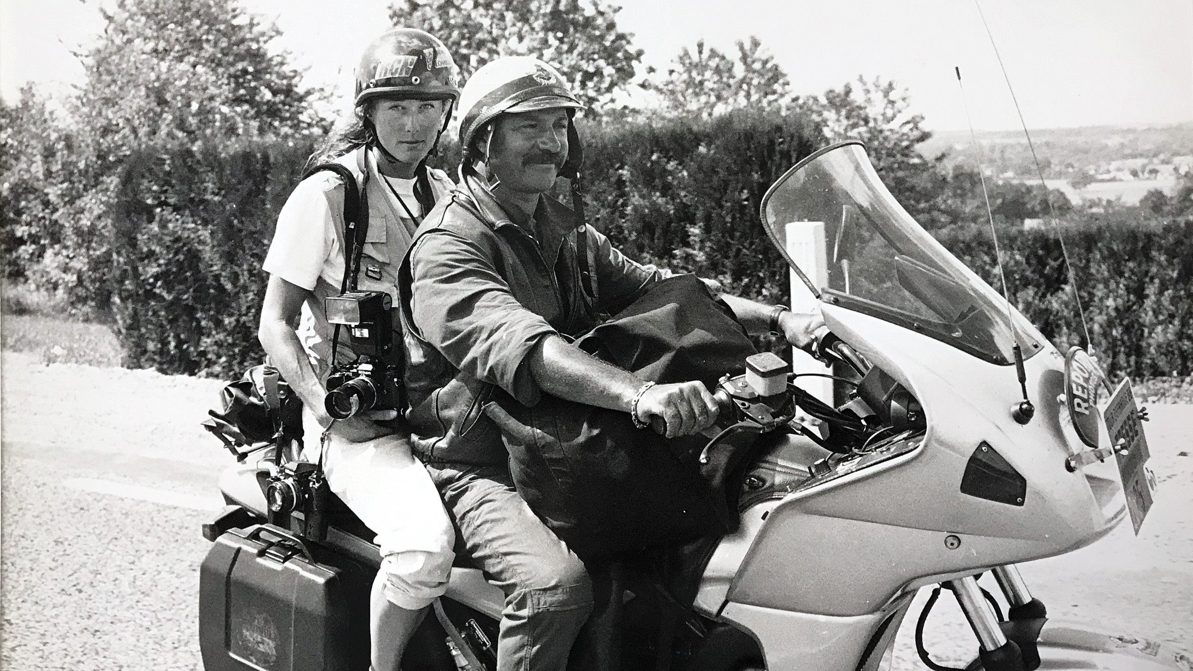 Darcy Kiefel on the back of a motorcycle