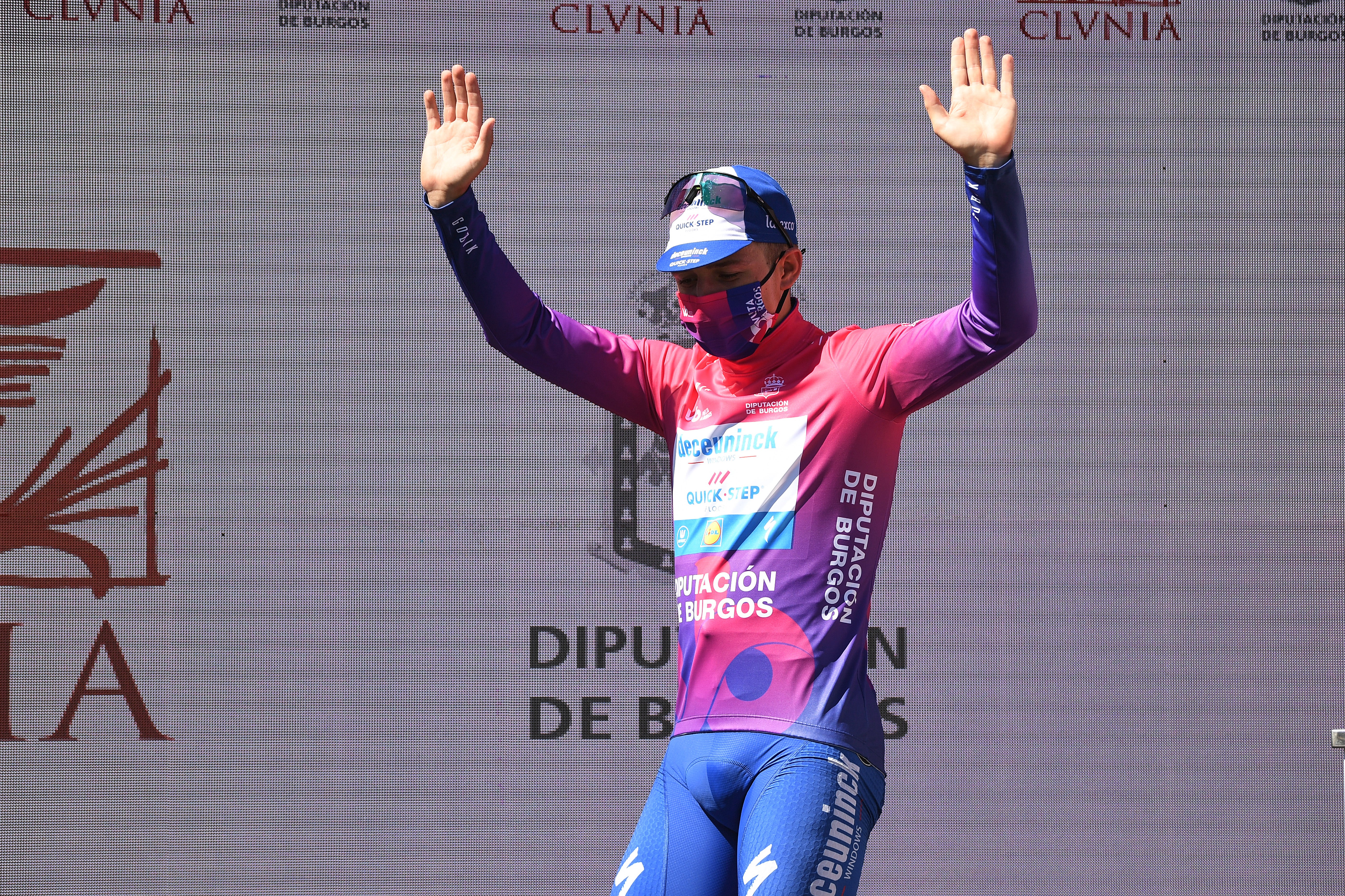 LAGUNAS DE NEILA, SPAIN - AUGUST 01: Podium / Remco Evenepoel of Belgium and Team Deceuninck - Quick-Step Purple Leader Jersey / Celebration / during the 42nd Vuelta a Burgos 2020, Stage 5 a 158km stage from Covarrubias to Lagunas de Neila 1872m / #VueltaBurgos / on August 01, 2020 in Lagunas de Neila, Spain. (Photo by David Ramos/Getty Images)