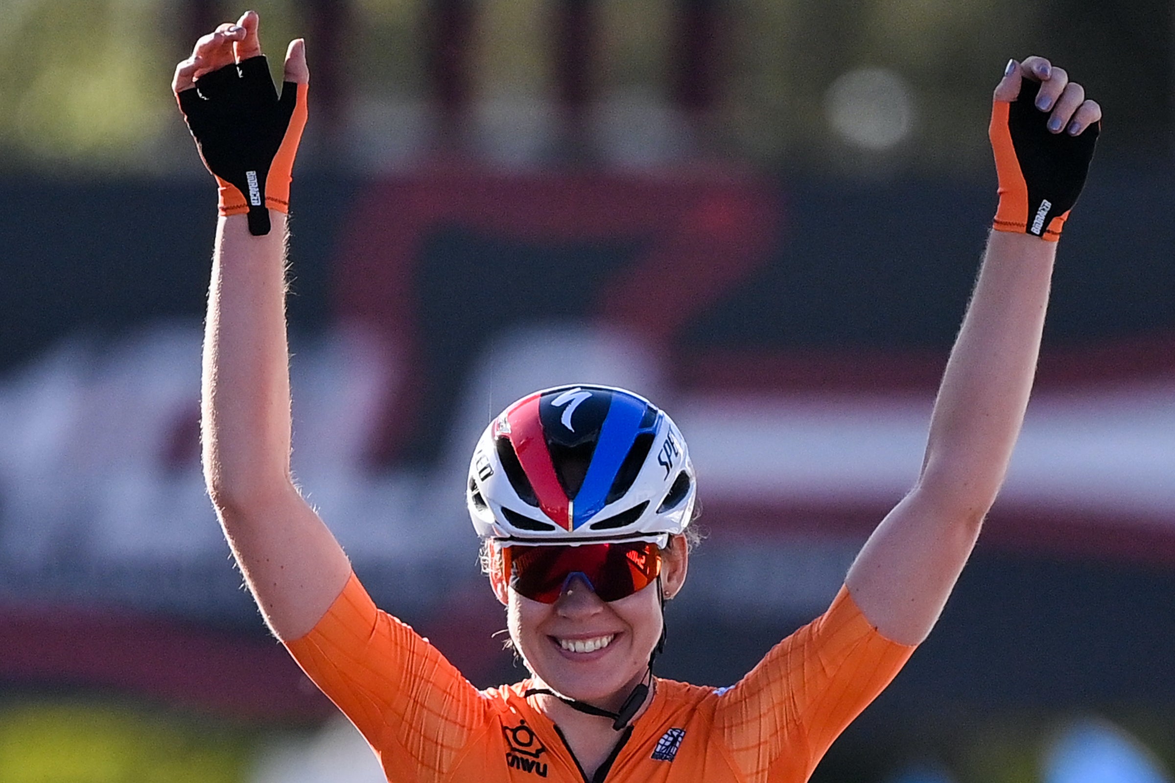 Netherlands' Anna van der Breggen celebrates as she crosses the finish line to win the Women's Elite Road Race, a 143-kilometer route around Imola, Emilia-Romagna, Italy, on September 26, 2020 as part of the UCI 2020 Road World Championships. (Photo by Marco BERTORELLO / AFP) (Photo by MARCO BERTORELLO/AFP via Getty Images)