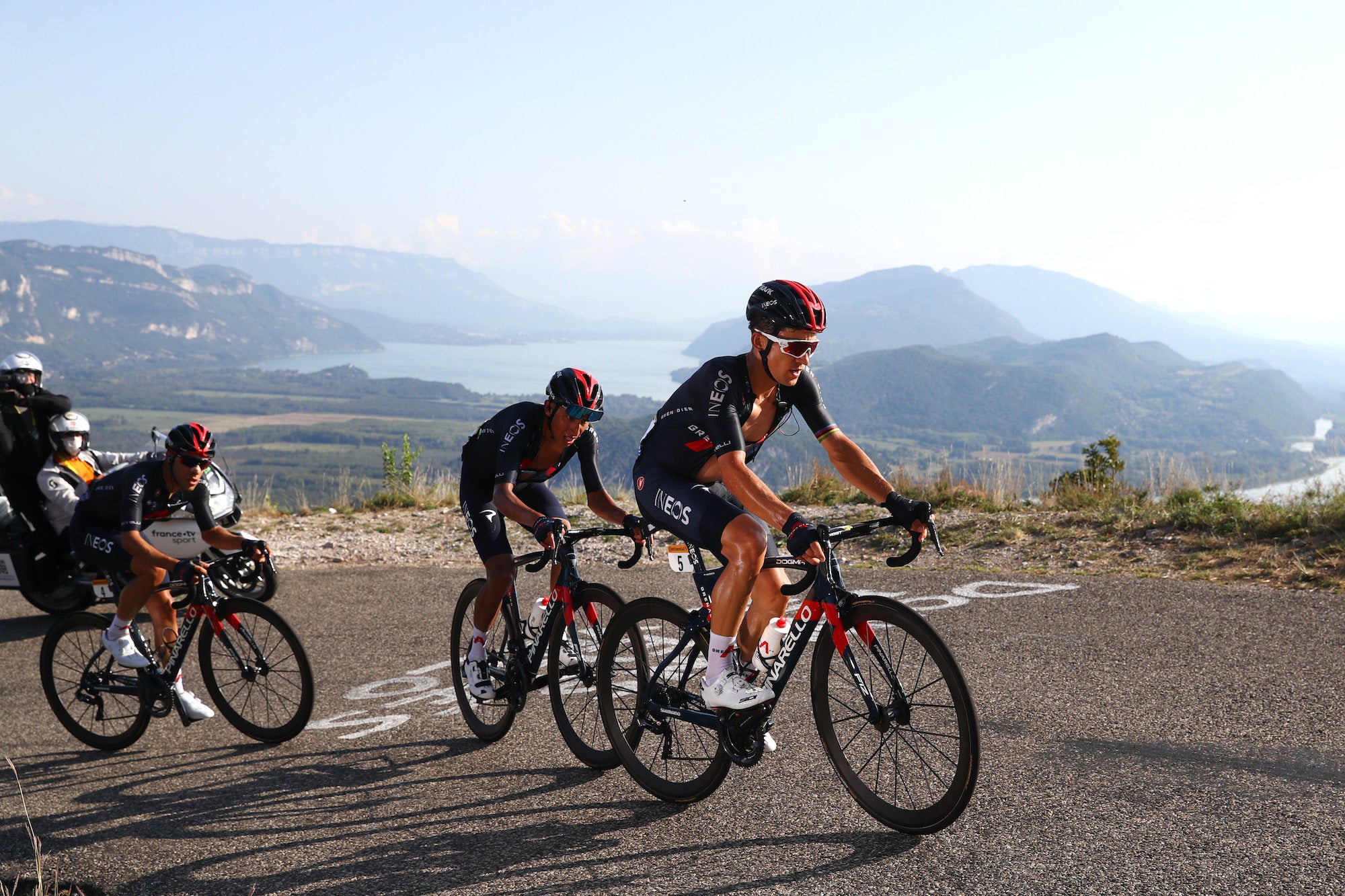 Kwiatkowski tows Bernal after the Colombian's Grand Colombier collapse.