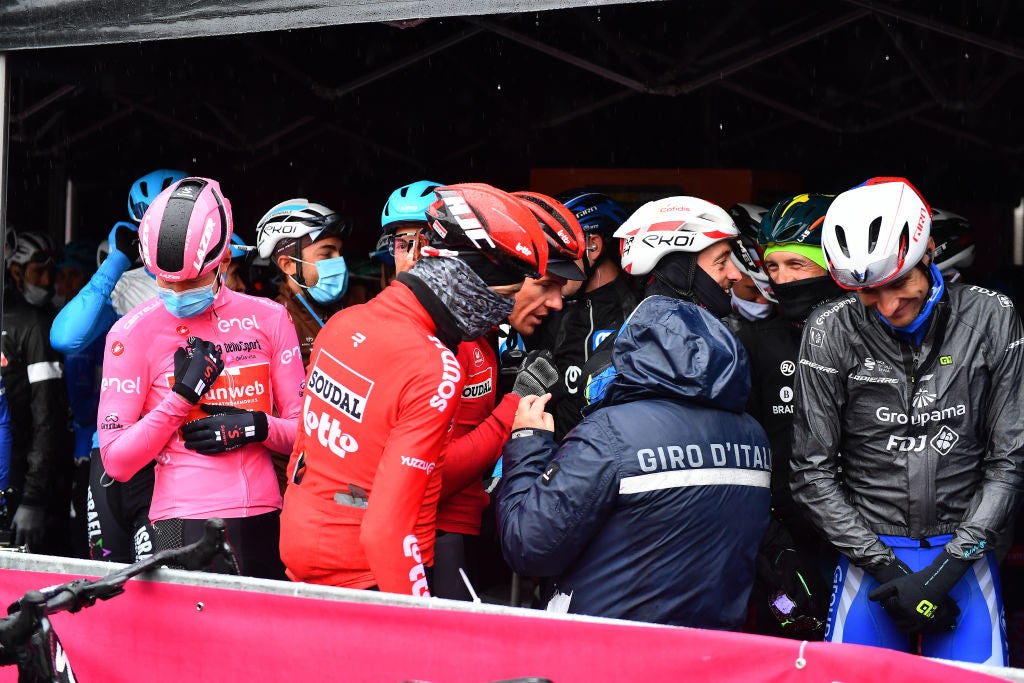 Riders protested ahead of a rainsoaked 258km stage in 2020.