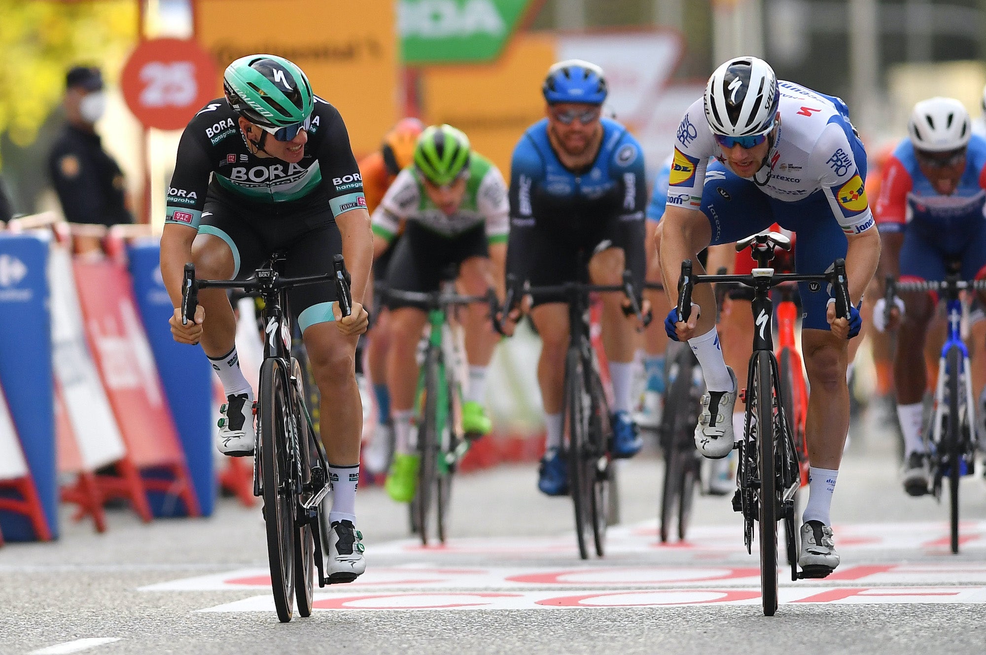 Pascal Ackermann edged Sam Bennett for the stage 18 win.