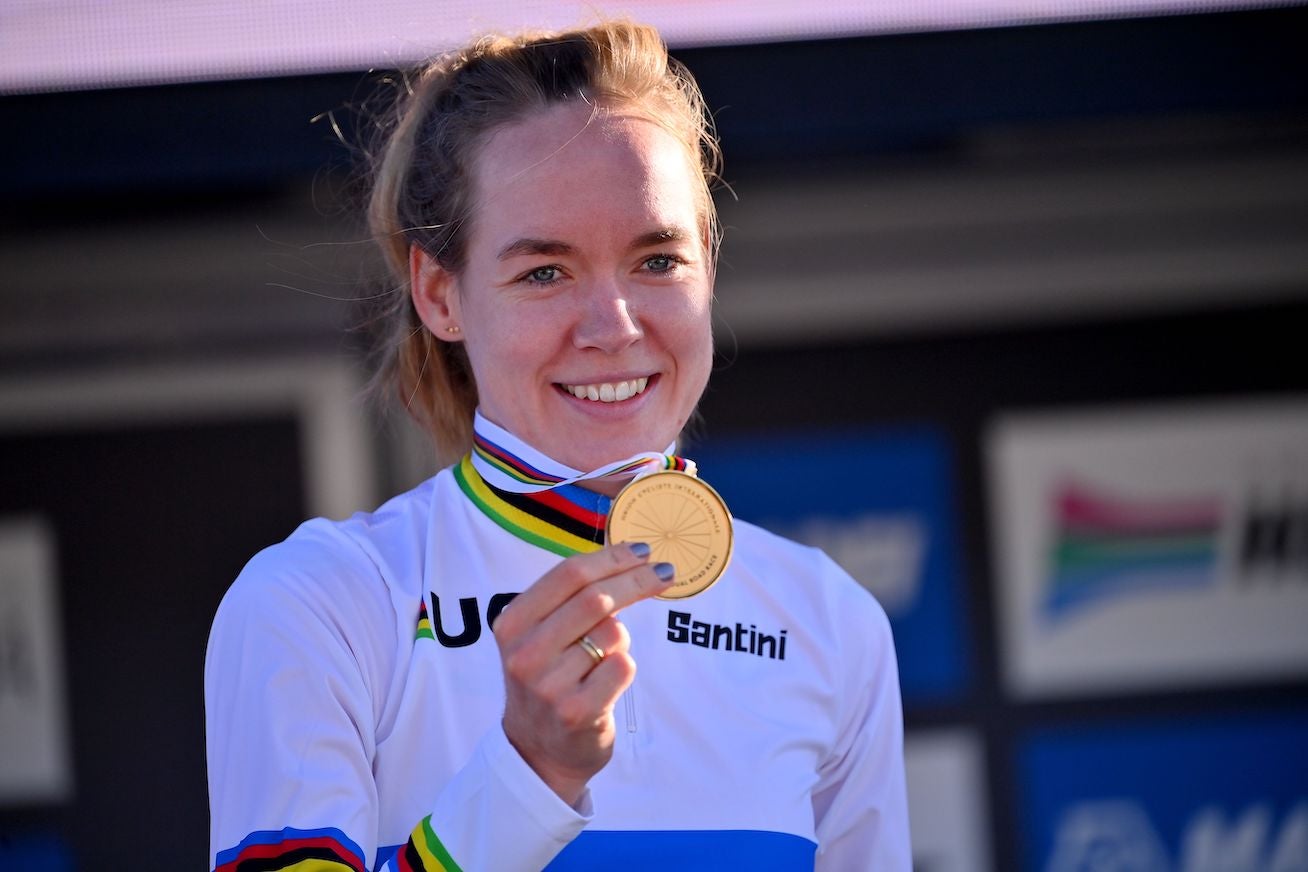 Netherlands' Anna van der Breggen poses with her medal on the podium after winning the Women's Elite Road Race, a 143-kilometer route around Imola, Emilia-Romagna, Italy, on September 26, 2020 as part of the UCI 2020 Road World Championships. (Photo by Marco BERTORELLO / AFP) (Photo by MARCO BERTORELLO/AFP via Getty Images)