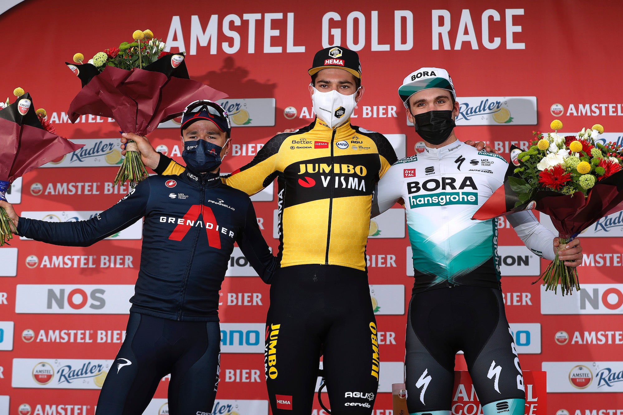 BERG, NETHERLANDS - APRIL 18: Podium / Thomas Pidcock of United Kingdom and Team INEOS Grenadiers, Wout Van Aert of Belgium and Team Jumbo - Visma &amp; Maximilian Schachmann of Germany and Team Bora - Hansgrohe Celebration, during the 55th Amstel Gold Race 2021, Men's Elite a 216,7km race from Valkenburg to Berg en Terblijt / Mask / Covid Safety Measures / @Amstelgoldrace / #amstelgoldrace / on April 18, 2021 in Berg, Netherlands. (Photo by )