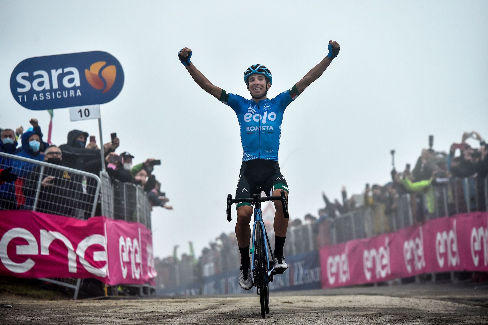Team EOLO - Kometa Cycling Team rider Italy's Lorenzo Fortunato celebrates as he crosses the finish line to win the 14th stage of the Giro d'Italia 2021 cycling race, 205km between Citadella and Monte Zoncolan on May 22, 2021. (Photo by Tommaso Pelagalli / AFP) (Photo by TOMMASO PELAGALLI/AFP via Getty Images)