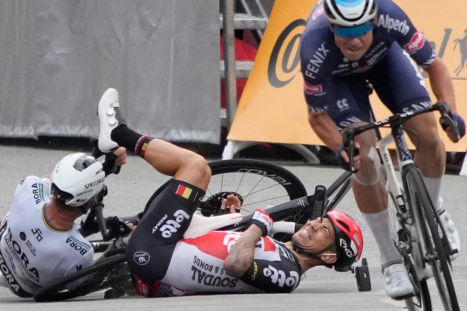 Team Lotto Soudal's Caleb Ewan of Australia (R) reacts as he falls with Team Bora Hansgrohe's Peter Sagan of Slovakia (L) close to the finish line of the 3rd stage of the 108th edition of the Tour de France cycling race, 182 km between Lorient and Pontivy, on June 28, 2021. (Photo by Christophe Ena / various sources / AFP) (Photo by CHRISTOPHE ENA/AFP via Getty Images)